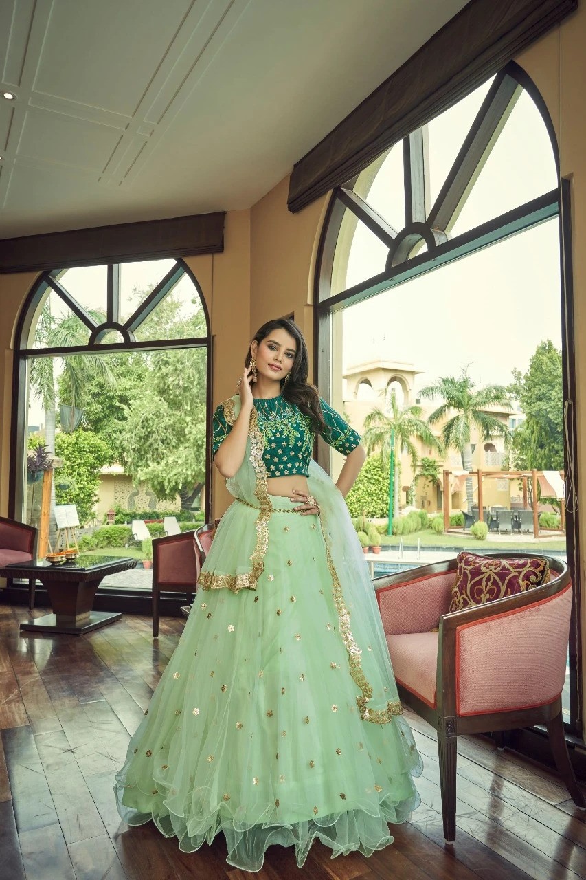 Lush Green Net Lehenga Choli with Alluring Embroidery