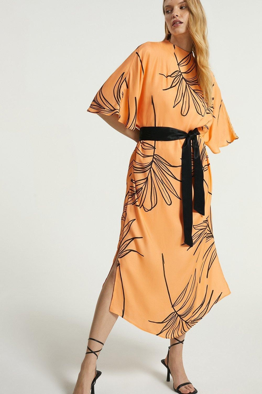 Women's Party Wear Orange Color Printed Dress