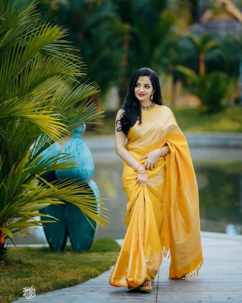 Beautiful Jacquard Work Lichi Silk Saree in Radiant Yellow with a Stunning Pallu